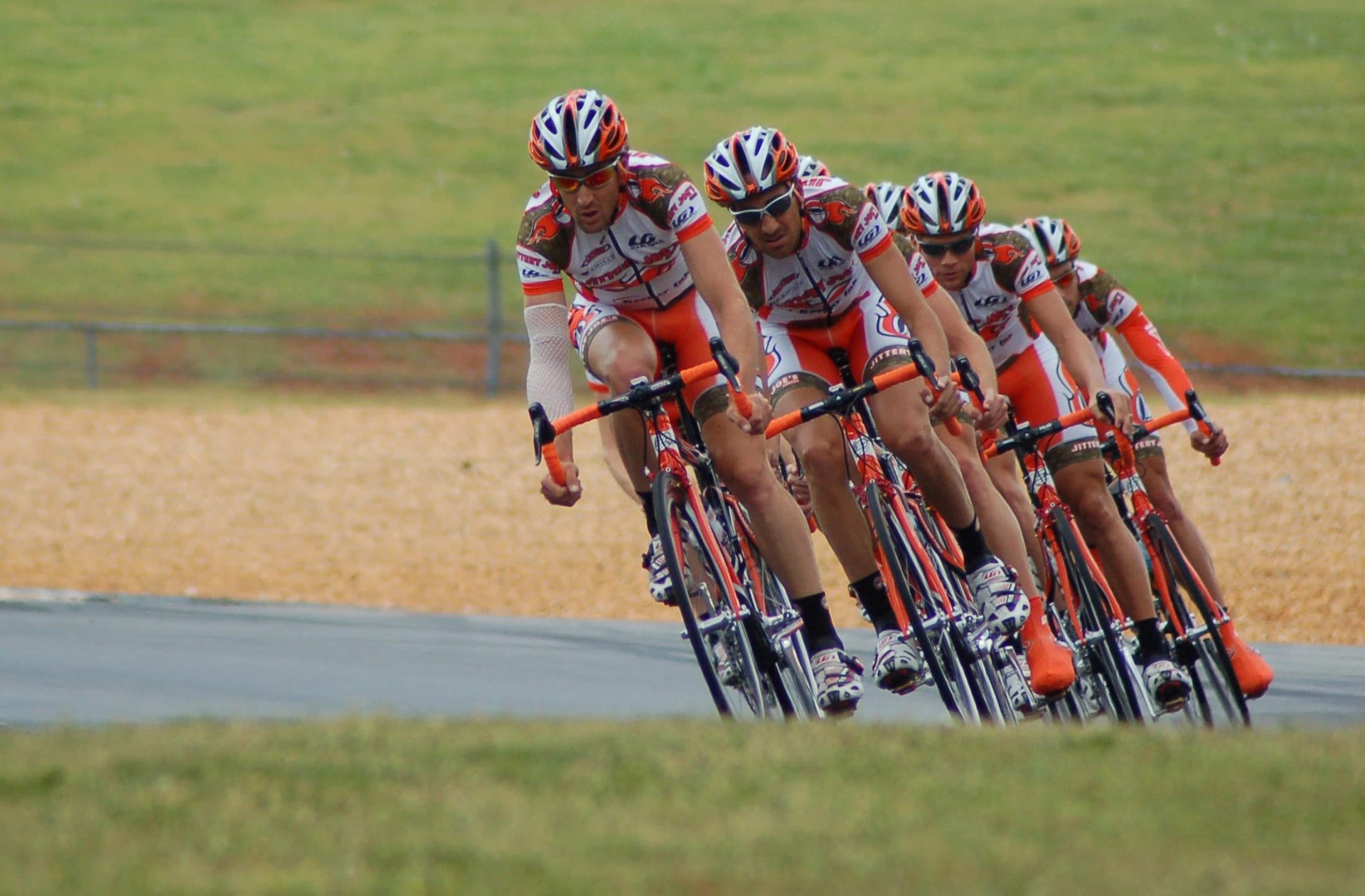 Pack of cyclists racing in formation